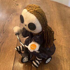 Source Unknown Button-Eyed Doll on Tricycle - Black and Brown